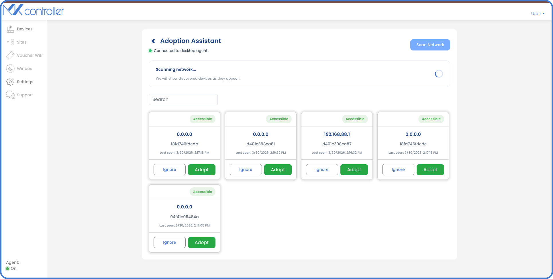 MKController Adoption Assistant scanning the local network and listing discovered devices with Ignore and Adopt buttons for each accessible device